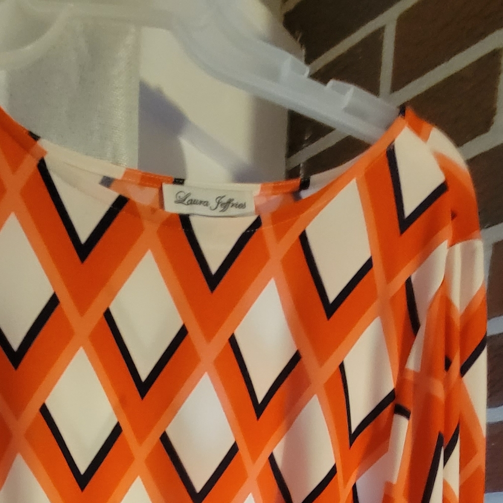 Dress size 18. Multi colored silky.